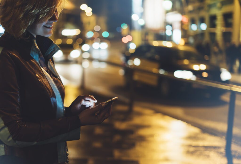 Girl,Pointing,Finger,On,Screen,Smartphone,On,Background,Illumination,Glow